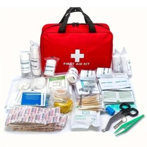 First aid kit with medical supplies and emergency tools for safety and health.