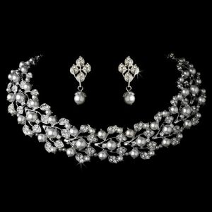 Elegant pearl and crystal jewelry set for bridal wedding accessories.