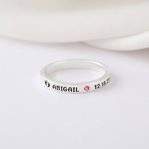 Custom engraved silver ring with name Abigail and date 12.18.21.