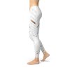 White FlexSculpt leggings with cutouts and geometric patterns for activewear.