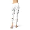 White FlexSculpt leggings with cutouts and geometric patterns for activewear.