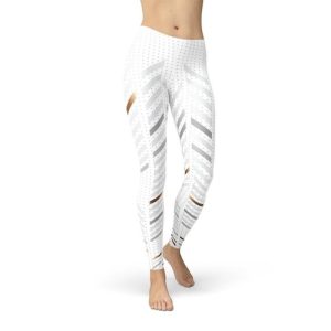 Women's white leggings with black stripes and cutouts, stylish activewear.